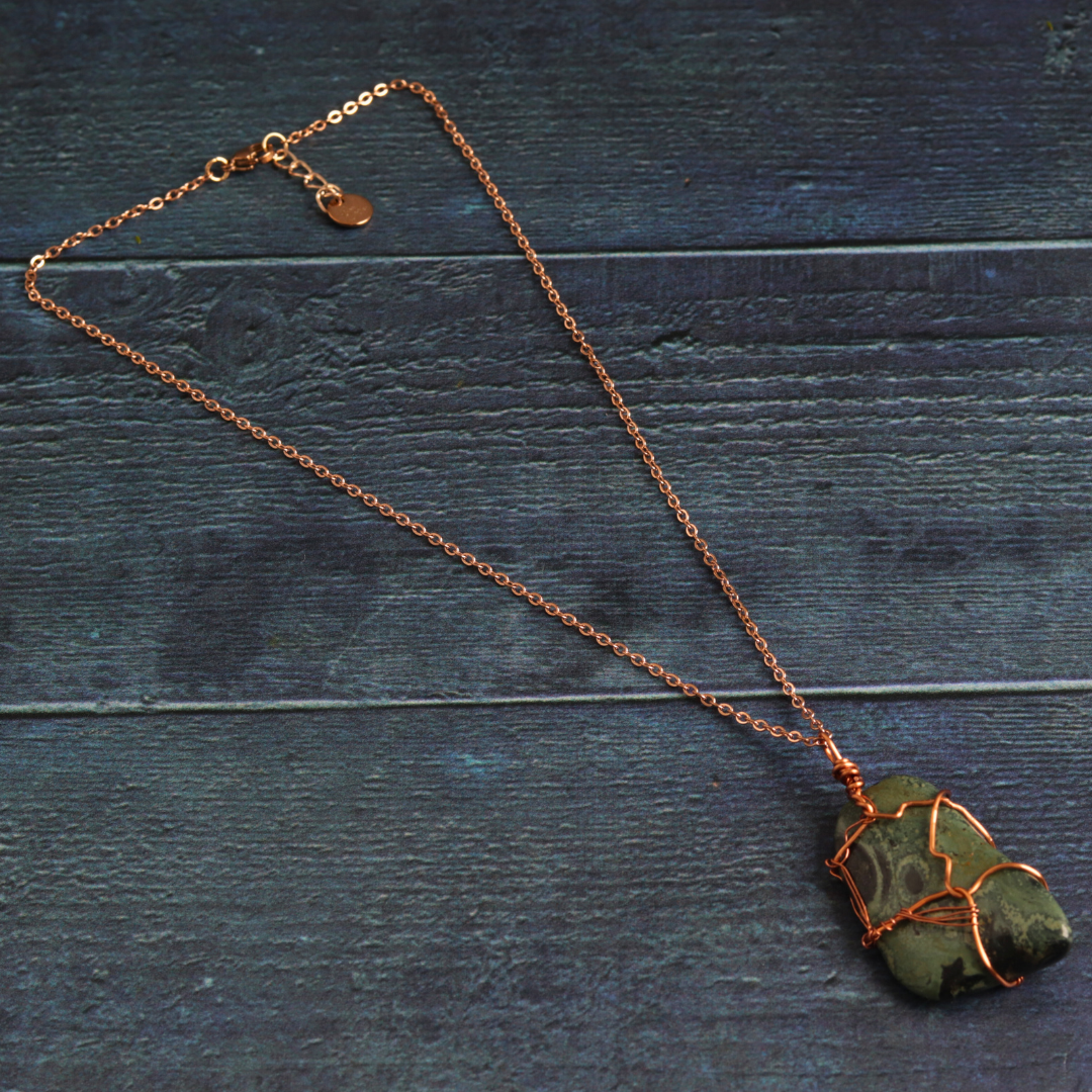 Rose gold wrapped nebula stone