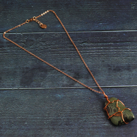 Rose gold wrapped nebula stone