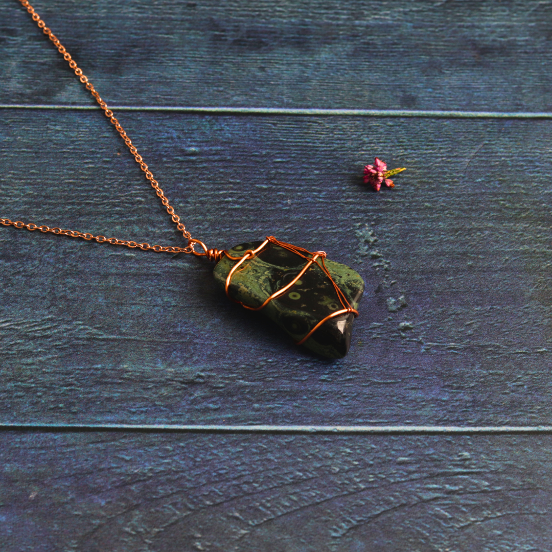 Rose gold wrapped nebula stone