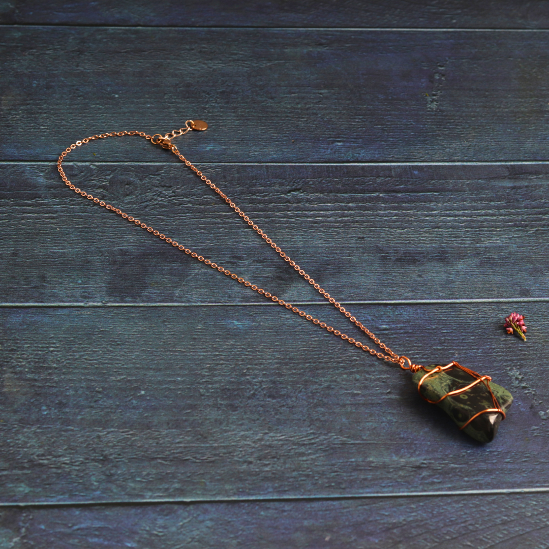 Rose gold wrapped nebula stone