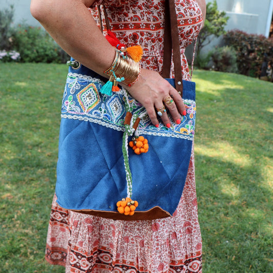 Tangerine pompom quilted bag