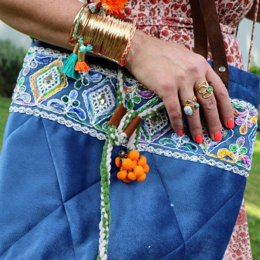 Tangerine pompom quilted bag